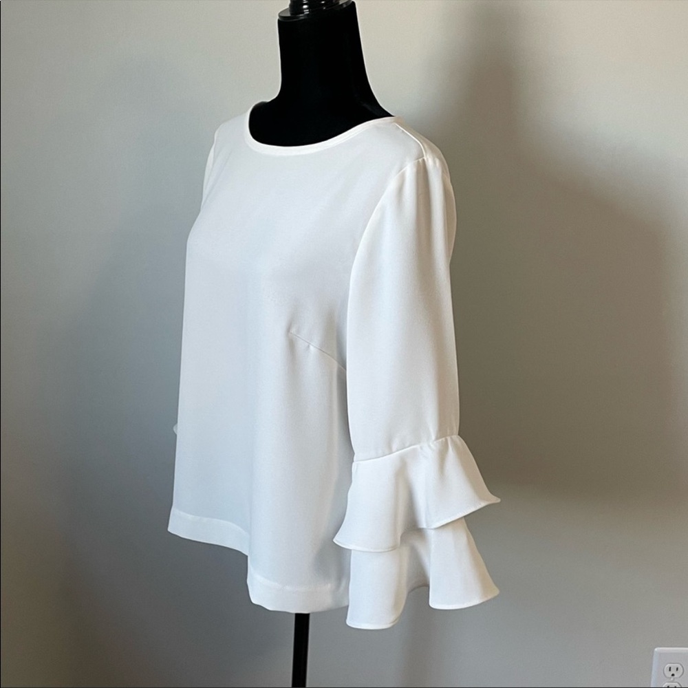 Tiered bell-sleeve top in white